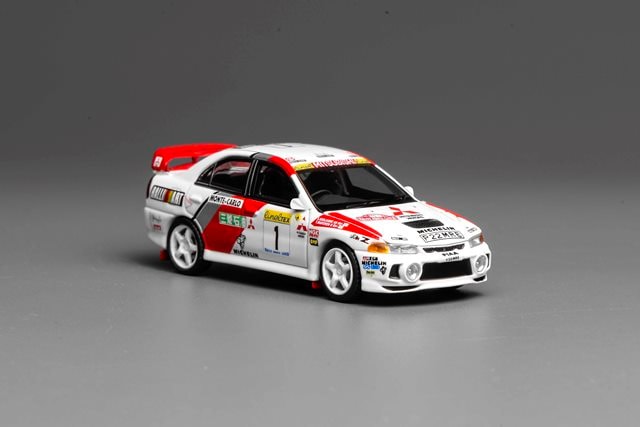 M64010 MOTORHELIX 1:64 Scale Mitsubishi Lancer Evolution IV GSR Monte Carlo Livery
