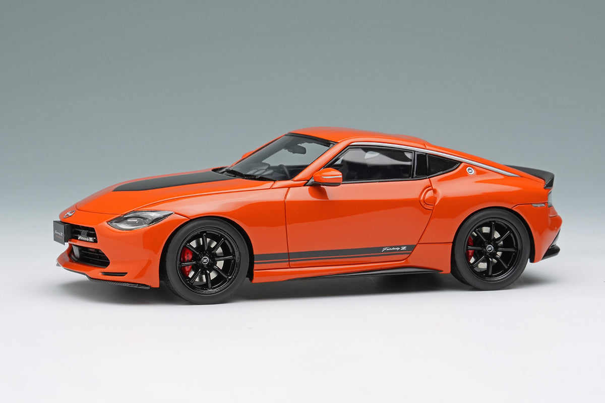 [ Back-order ] Make Up EIDOLON EM735A 1:43 Nissan Fairlady Z Customized Edition 2024 432 Orange model car