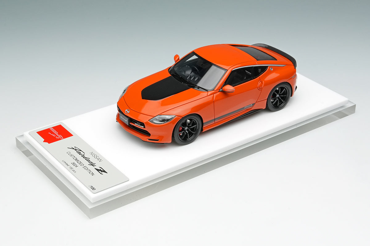[ Back-order ] Make Up EIDOLON EM735A 1:43 Nissan Fairlady Z Customized Edition 2024 432 Orange model car