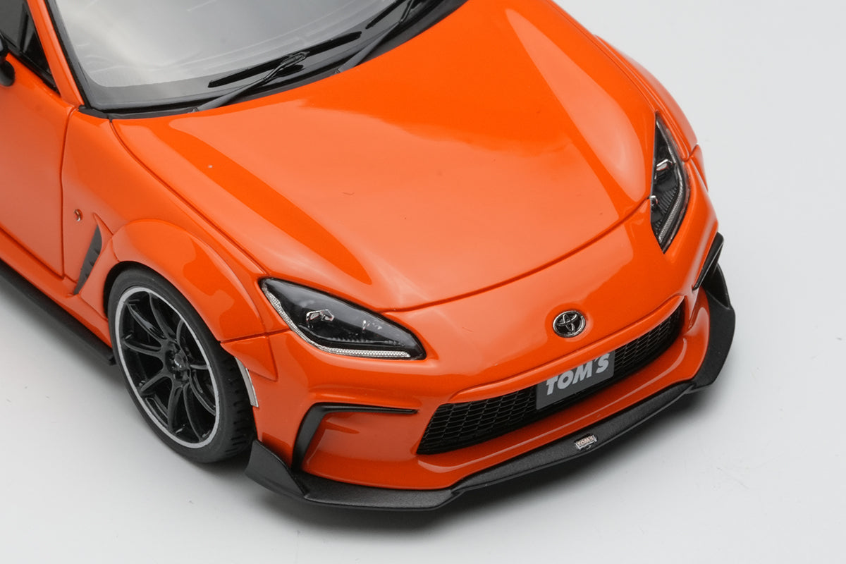 [ Back-order ] Make Up EIDOLON EM725A 1:43 TOM'S GR86 Widebody 2022 Orange model car