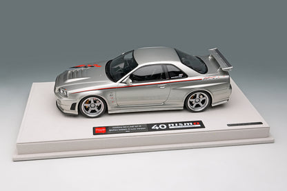 EML135A Make Up EIDOLON 1:18 Nissan Skyline GT-R BNR34 NISMO R-tune Ver 2004 Silver Nismo Stripes