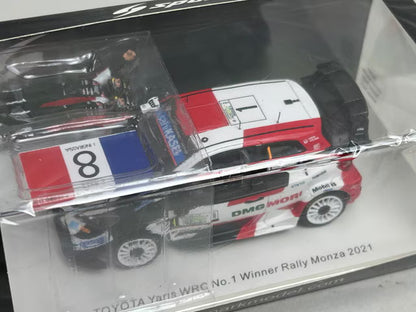 1:43 Spark S6595 Toyota Yaris WRC #1 Winner Rally Monza 2021 / 2021 WRC Manufacturers' Champion - S. Ogier (Includes figure/flag)