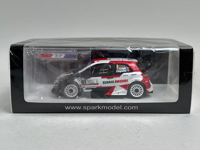 1:43 Spark S6595 Toyota Yaris WRC #1 Winner Rally Monza 2021 / 2021 WRC Manufacturers' Champion - S. Ogier (Includes figure/flag)