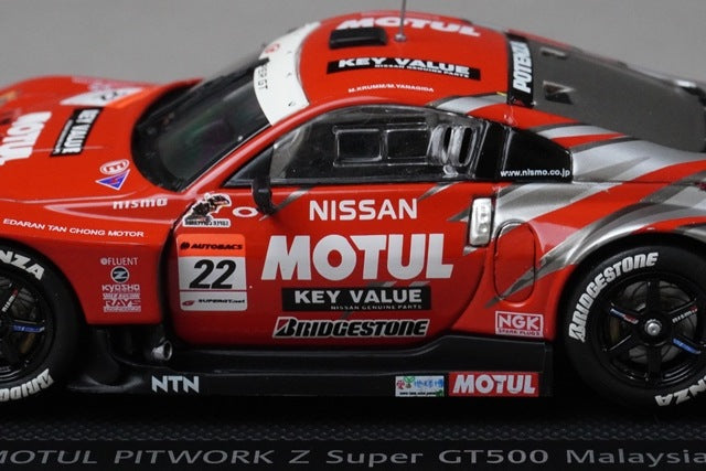 1:43 EBBRO 43722 XANAVI NISMO Z Super GT 2005 Malaysia #1 Silver / Red model car