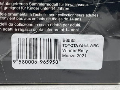 1:43 Spark S6595 Toyota Yaris WRC #1 Winner Rally Monza 2021 / 2021 WRC Manufacturers' Champion - S. Ogier (Includes figure/flag)