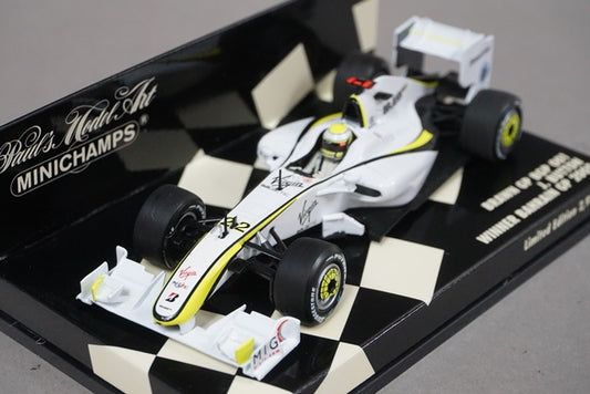 1:43 MINICHAMPS 400090322 Brown GP BGP 001 Bahrain GP 2009 J. Button #22