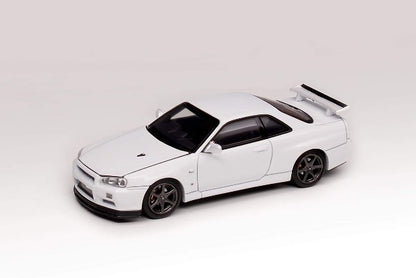 M63402 MOTORHELIX 1:64 Nissan Skyline GT-R R34 V Spec II Pearl White