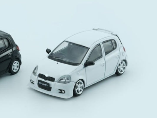 64B0378 BM Creations 1:64 Toyota Yaris / Echo / Vitz 1998 5-door White (RHD)