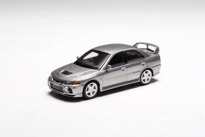 M64001 MOTORHELIX 1:64 Mitsubishi Lancer Evolution IV STEEL SILVER METALLIC model car
