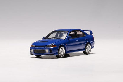 M64002 MOTORHELIX 1:64 Mitsubishi Lancer Evolution IV ICELLE BLUE model car