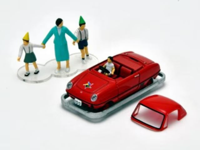 TOMYTEC 1:64 Nissan Kodomo no Kuni x TLV Datsun Baby Restored Car (Red) with Figure 336624