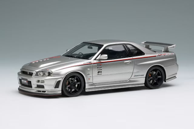 [ Pre-order ] EM792 Make Up EIDOLON 1:43 Nissan NISMO R34 Z-tune Prototype 2001 Silver with NISMO Stripes