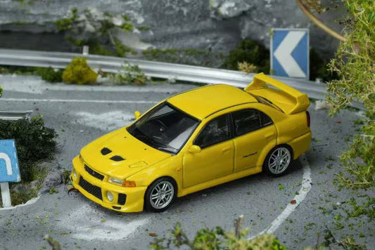[ Pre-order ] M64102 MOTORHELIX 1:64 Mitsubishi Lancer Evolution V GSR Dandelion Yellow