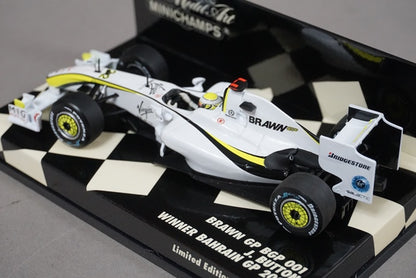 1:43 MINICHAMPS 400090322 Brown GP BGP 001 Bahrain GP 2009 J. Button #22