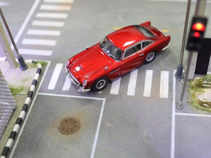 DCM 1:64 Aston Martin DB5 Transparent Red with figure