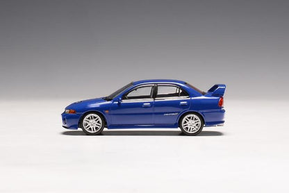 M64002 MOTORHELIX 1:64 Mitsubishi Lancer Evolution IV ICELLE BLUE model car
