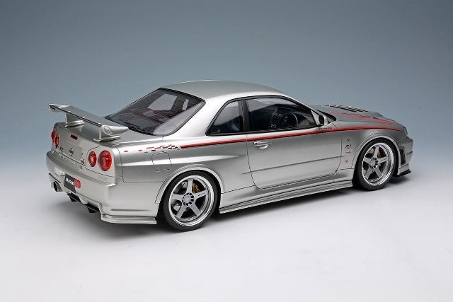 EML135A Make Up EIDOLON 1:18 Nissan Skyline GT-R BNR34 NISMO R-tune Ver 2004 Silver Nismo Stripes