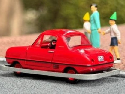 TOMYTEC 1:64 Nissan Kodomo no Kuni x TLV Datsun Baby Restored Car (Red) with Figure 336624