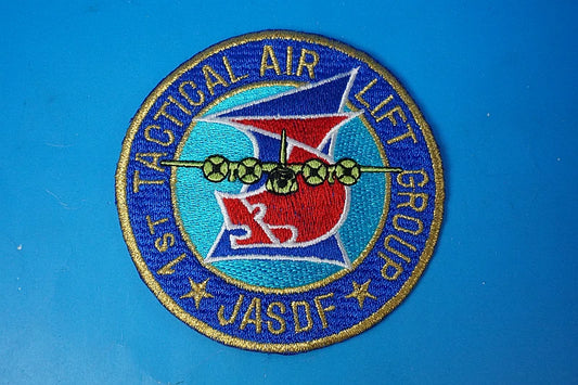 Patch JASDF C-130H / KC-767 – 1st Tactical Airlift Group, Komaki Air Base – "Golden Shachi" (Gold Dolphin-Fish) – No Velcro backing