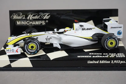 1:43 MINICHAMPS 400090322 Brown GP BGP 001 Bahrain GP 2009 J. Button #22