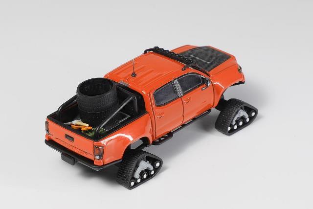 KS-077-507 GCD Gaincorp Products 1:64 Toyota Tacoma Hyper Delta Caterpillar Tacoma Snow Version Orange Red (LHD)