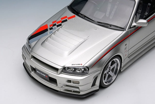 EML135A Make Up EIDOLON 1:18 Nissan Skyline GT-R BNR34 NISMO R-tune Ver 2004 Silver Nismo Stripes