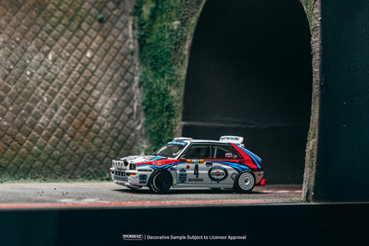 T64-049-92MCR04 Tarmac Works 1:64 Lancia Delta HF Integrale Monte Carlo Rally 1992 Winner