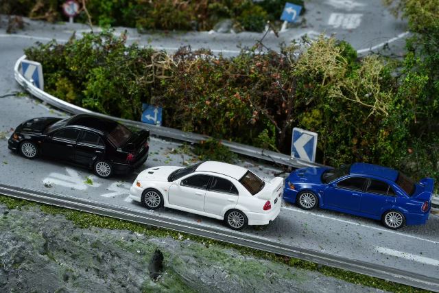 [ Pre-order ] M64201 MOTORHELIX 1:64 Mitsubishi Lancer Evolution VI GSR Pyrenees Black Pearl