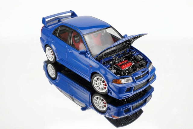 [ Pre-order ] M84301 MOTORHELIX 1:18 Mitsubishi Lancer Evolution VI GSR T.M.E Canal Blue