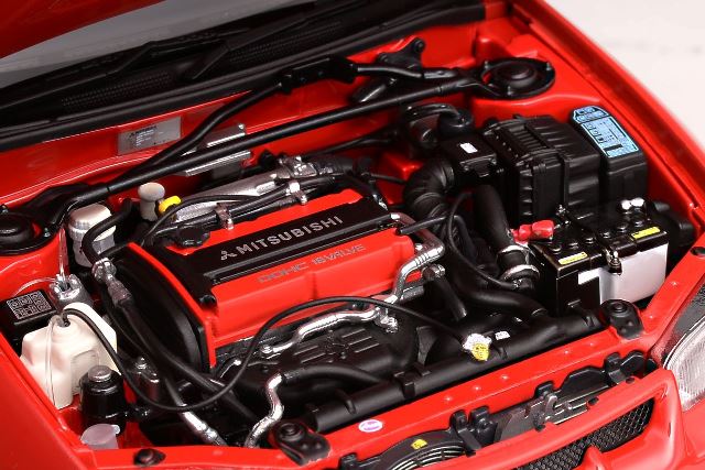 M84004 MOTORHELIX 1:18 Scale Mitsubishi Lancer Evolution IV. Palma Red