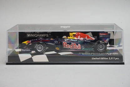 1:43 MINICHAMPS 410110101 Red Bull Racing Renault RB7 Malaysian GP #1 S.Vettel