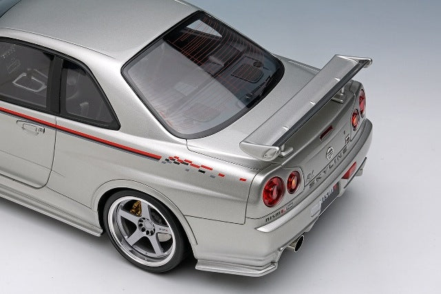 EML135A Make Up EIDOLON 1:18 Nissan Skyline GT-R BNR34 NISMO R-tune Ver 2004 Silver Nismo Stripes