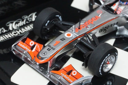 1:43 MINICHAMPS 530104301 Vodafone McLaren Mercedes MP4-25 2010 #1 J. model car