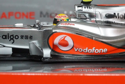 1:43 MINICHAMPS 533104302 Vodafone McLaren Mercedes MP4-25 2010 #2 L.Hamilton