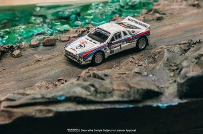 T64P-TL002-83RMC01 Tarmac Works 1:64 Lancia 037 Rally Monte Carlo 1983 Winner W. Rohrl / C. Geistdorfer model car