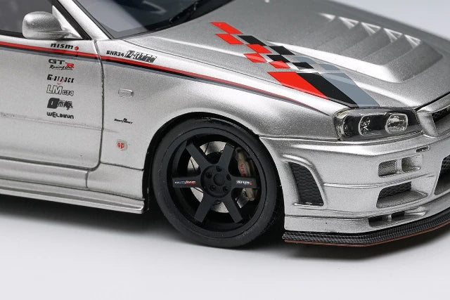 [ Pre-order ] EM792 Make Up EIDOLON 1:43 Nissan NISMO R34 Z-tune Prototype 2001 Silver with NISMO Stripes