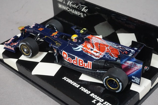 1:43 MINICHAMPS 400090012 Scuderia Toro Rosso STR4 2009 S. Buemi #12