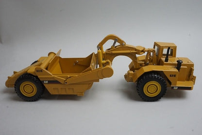 1:50 NORSCOT 55699 Caterpillar CAT 631E Scraper model car