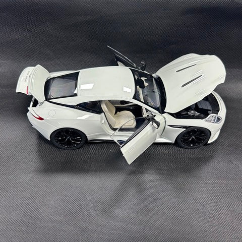 8250628YG XiaoGuang MODEL 1:18 Aston Martin DB12 White Glow in the Dark with Replacement Wheels