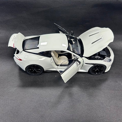 8250628YG XiaoGuang MODEL 1:18 Aston Martin DB12 White Glow in the Dark with Replacement Wheels