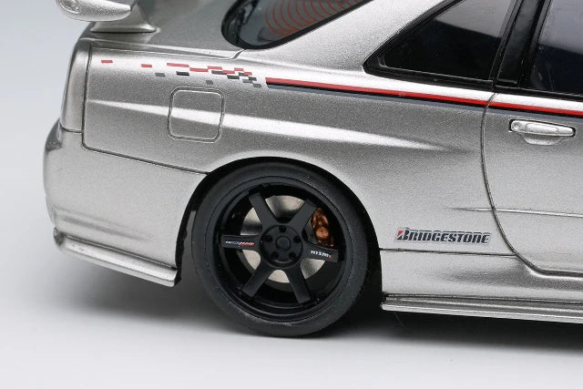 [ Pre-order ] EM792 Make Up EIDOLON 1:43 Nissan NISMO R34 Z-tune Prototype 2001 Silver with NISMO Stripes