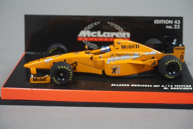 1:43 MINICHAMPS 530974389 McLaren Mercedes MP 4/12 Testcar Mobil #9 Orange