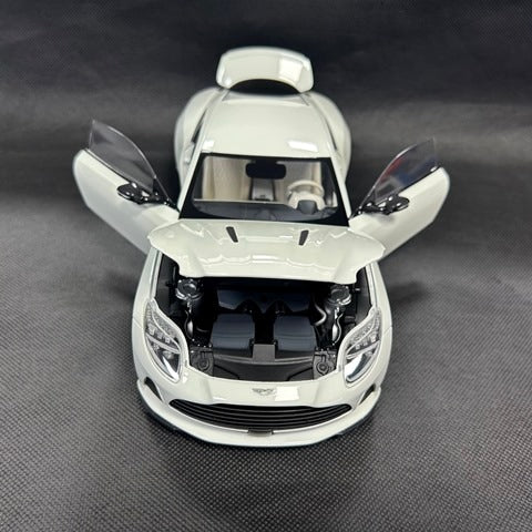 8250628YG XiaoGuang MODEL 1:18 Aston Martin DB12 White Glow in the Dark with Replacement Wheels