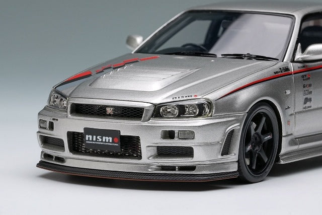 [ Pre-order ] EM792 Make Up EIDOLON 1:43 Nissan NISMO R34 Z-tune Prototype 2001 Silver with NISMO Stripes