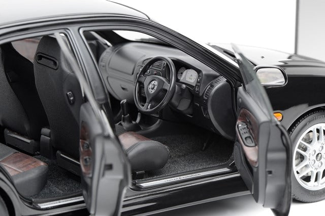 M84002 MOTORHELIX 1:18 Mitsubishi Lancer Evolution IV Pyrenees Black Pearl model car