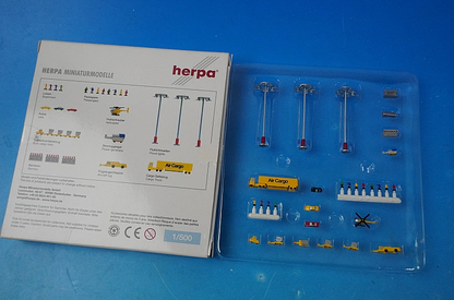 1:500 Airport accessories Towing vehicle, passenger vehicle, baggage towing vehicle, lighting tower, luggage trailer, helicopter, barrier, doll set Diorama 519557 Herpa
