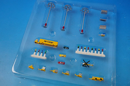 1:500 Airport accessories Towing vehicle, passenger vehicle, baggage towing vehicle, lighting tower, luggage trailer, helicopter, barrier, doll set Diorama 519557 Herpa