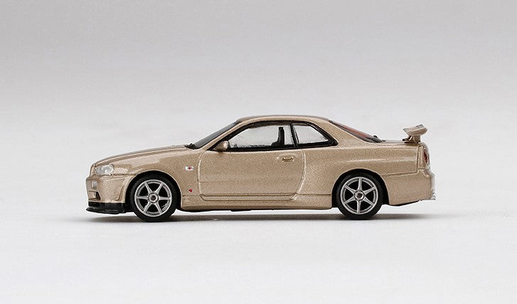 MGT00348-R TSM MINI-GT 1:64 Nissan Skyline GT-R R34 M-spec Silica Breath RHD