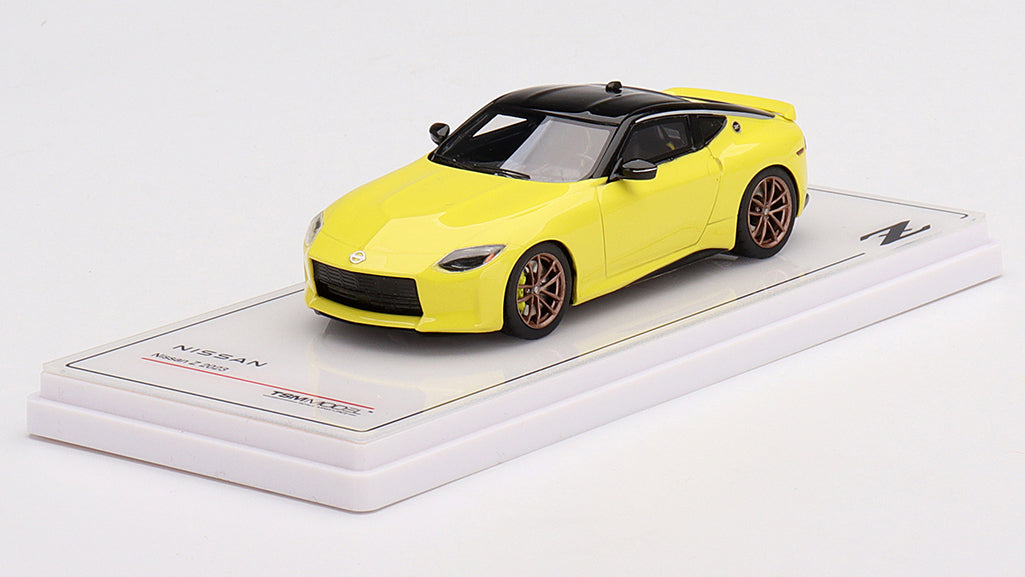 [ Back-order ] TSM TSM430644 1:43 Nissan Z Protospec 2023 Ikazuchi Yellow LHD model car