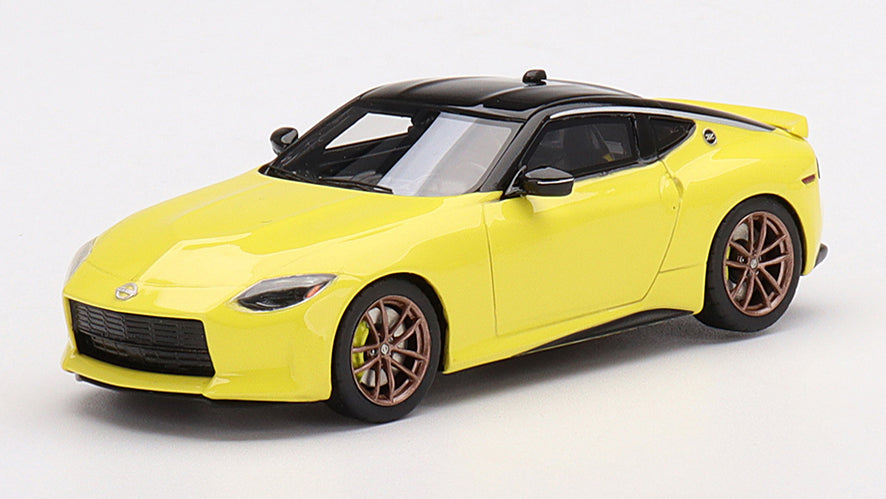 [ Back-order ] TSM TSM430644 1:43 Nissan Z Protospec 2023 Ikazuchi Yellow LHD model car